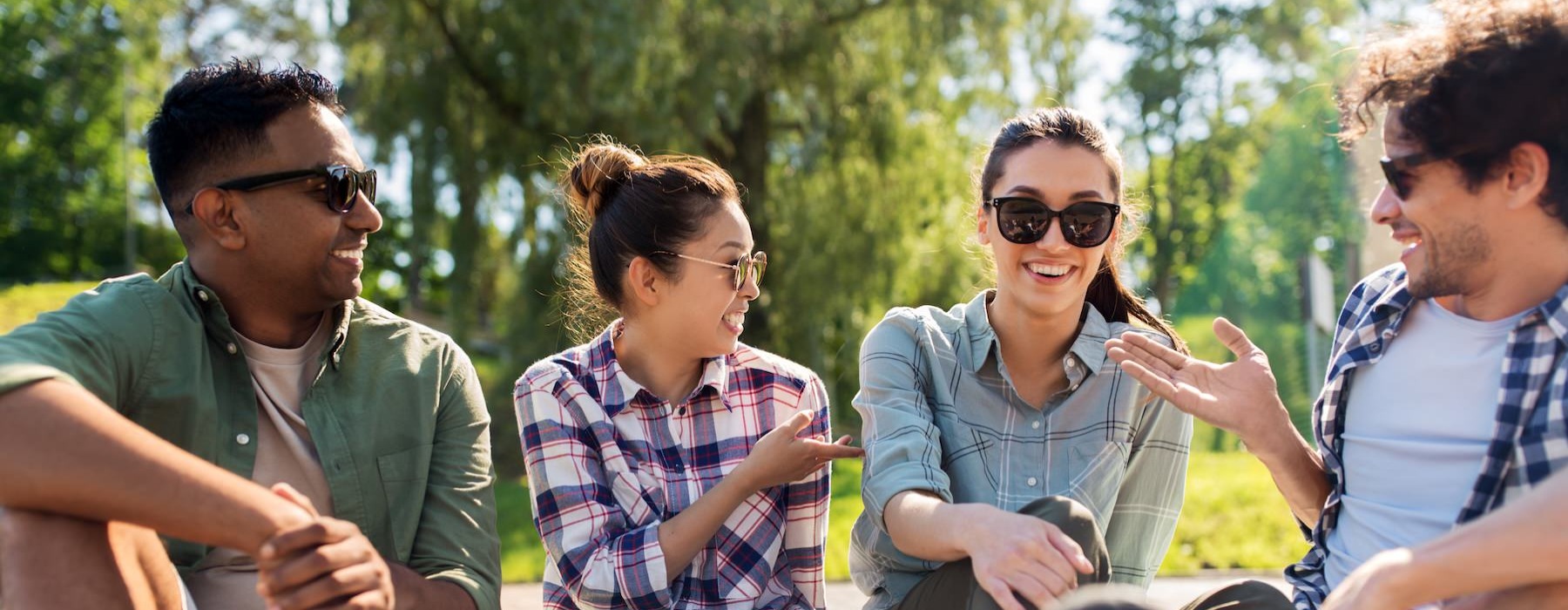 a group of people sitting down and talking