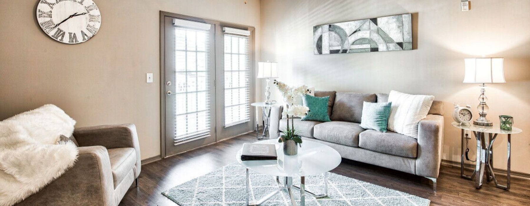 a living room with a couch and a table